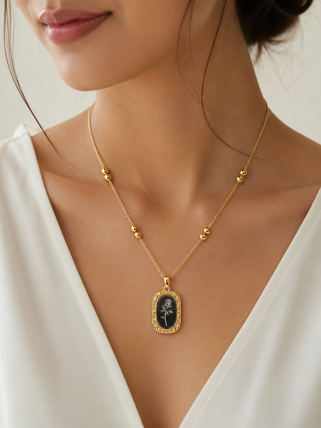 Delicate Gold Onyx Pendant